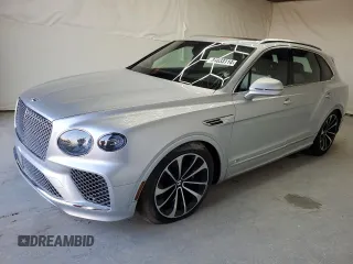 2021 Bentley Bentayga V8 z VIN SJAAM2ZV4MC034001, wystawiony jako Copart lot #84033114 z przebiegiem Nie podano mil oraz Szkoda całkowita • Salvage title. Historia ofert i sprzedaży dostępna na DreamBid. Obrazek 1.