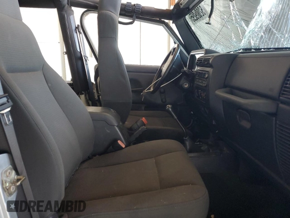 2006 Jeep Wrangler Rubicon with VIN 1J4FA69S26P734731, listed as a Copart auction lot 52009295 with 117,872 mi miles and Salvage title. Bid and sale history available at DreamBid. Image 10.