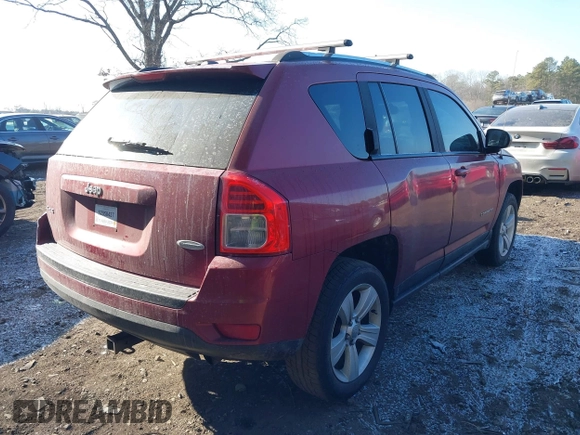 2013 Jeep Compass Latitude with VIN 1C4NJDEB3DD186328, listed as a IAAI auction lot 41357490 with 212,608 mi miles. Bid and sale history available at carsss.com. Image 4.