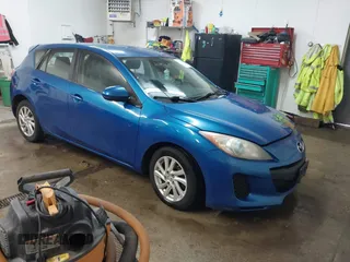 2012 Mazda Mazda3 i Touring with VIN JM1BL1L76C1523276, listed as a IAAI auction lot 41622731 with 184,907 mi miles. Bid and sale history available at carsss.com. Image 1.