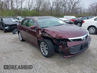 2014 Toyota Avalon Limited with VIN 4T1BK1EB5EU124568, listed as a IAAI auction lot 41996280 with 102,440 mi miles. Bid and sale history available at carsss.com. Image 1.