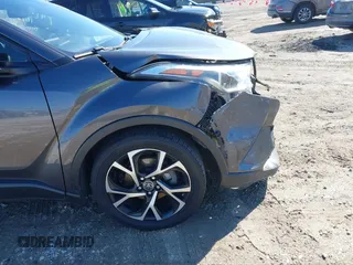 2018 Toyota C-HR XLE z VIN NMTKHMBX5JR042941, wystawiony jako IAAI lot #41803153 z przebiegiem 110 220 mil mil oraz . Historia ofert i sprzedaży dostępna na DreamBid. Obrazek 18.