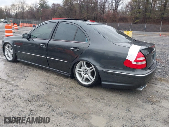 2003 Mercedes-Benz E-Class 5.5L AMG with VIN WDBUF76JX3A267197, listed as a IAAI auction lot 41485778 with 89,310 mi miles. Bid and sale history available at carsss.com. Image 3.