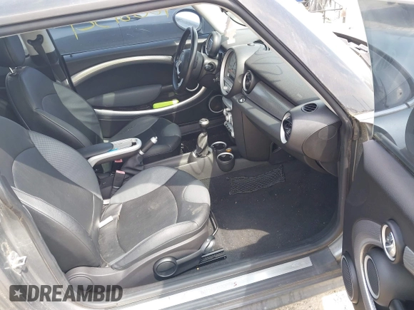 2007 MINI Hardtop S with VIN WMWMF73567TT82315, listed as a IAAI auction lot 42081321 with 123,072 mi miles and . Bid and sale history available at DreamBid. Image 5.
