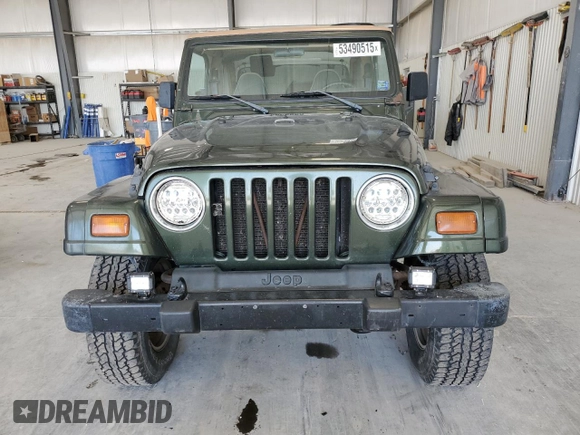 1998 Jeep Wrangler Sahara z VIN 1J4FY49S4WP728476, wystawiony jako Copart lot #53490515 z przebiegiem 272 058 mil mil oraz Czysty tytuł • Clean title. Historia ofert i sprzedaży dostępna na DreamBid. Obrazek 5.