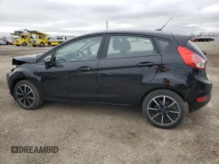 2019 Ford Fiesta SE z VIN 3FADP4EJ8KM124903, wystawiony jako Copart lot #54560125 z przebiegiem 86 616 mil mil oraz Szkoda całkowita • Salvage title. Historia ofert i sprzedaży dostępna na DreamBid. Obrazek 2.