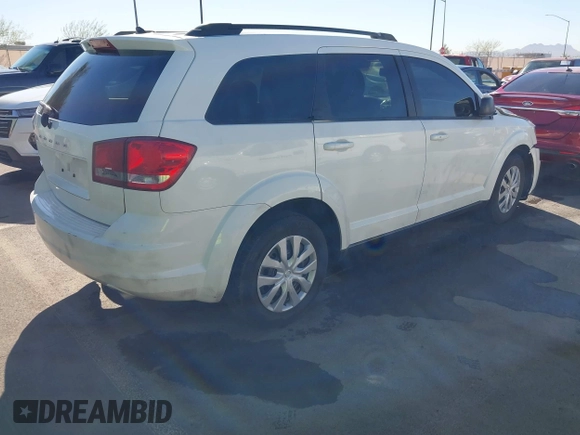 2014 Dodge Journey American Value Pkg with VIN 3C4PDCAB5ET230096, listed as a IAAI auction lot 41846510 with 178,397 mi miles. Bid and sale history available at carsss.com. Image 4.