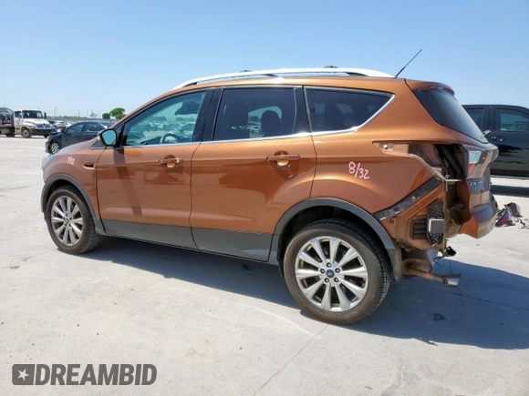 2017 Ford Escape Titanium with VIN 1FMCU0JD3HUA31410, listed as a Copart auction lot 52729025 with 68,256 mi miles and Salvage Title. Bid and sale history available at DreamBid. Image 2.