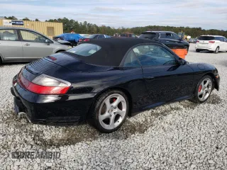 2004 Porsche 911 Carrera with VIN WP0CA29974S653815, listed as a Copart auction lot 80561034 with 63,686 mi miles and Salvage Title. Bid and sale history available at carsss.com. Image 3.