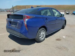 2017 Toyota Prius Two with VIN JTDKBRFUXH3044163, listed as a IAAI auction lot 42196278 with 117,610 mi miles and . Bid and sale history available at DreamBid. Image 4.