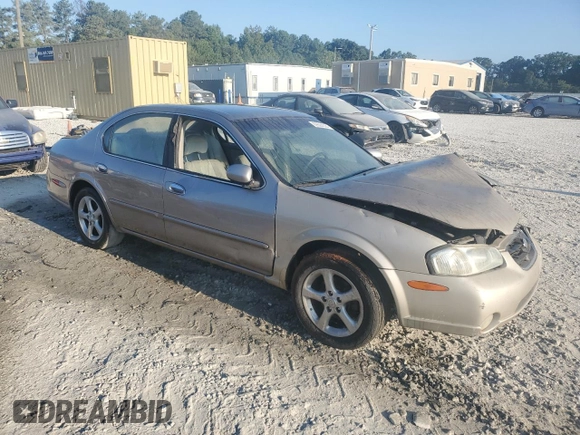 2001 Nissan Maxima GXE z VIN JN1CA31D11T828767, wystawiony jako Copart lot #69504024 z przebiegiem 177 431 mil mil oraz Szkoda całkowita • Salvage title. Historia ofert i sprzedaży dostępna na DreamBid. Obrazek 4.