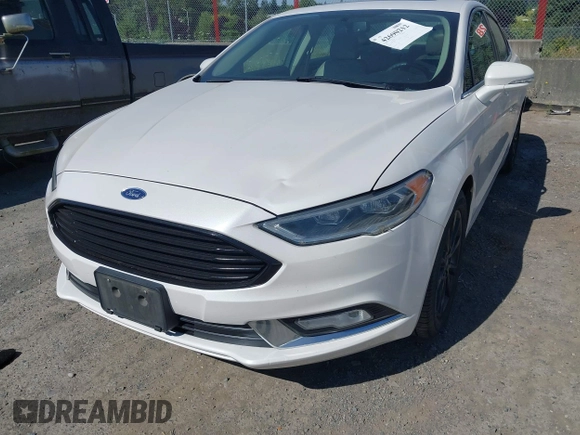 2017 Ford Fusion SE z VIN 3FA6P0HD3HR132779, wystawiony jako IAAI lot #42690212 z przebiegiem 165 293 mil mil oraz . Historia ofert i sprzedaży dostępna na DreamBid. Obrazek 6.