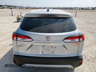 2023 Toyota Corolla Cross L z VIN 7MUAAAAG9PV039217, wystawiony jako Copart lot #57990905 z przebiegiem 13 405 mil mil oraz Szkoda całkowita • Salvage title. Historia ofert i sprzedaży dostępna na DreamBid. Obrazek 6.