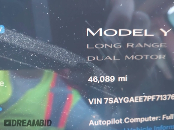 2023 Tesla Model Y Long Range with VIN 7SAYGAEE7PF713761, listed as a IAAI auction lot 41638067 with 46,089 mi miles and . Bid and sale history available at DreamBid. Image 7.