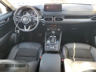 2021 Mazda CX-5 Touring with VIN JM3KFBCM9M0336910, listed as a Copart auction lot 48032275 with 65,515 mi miles and Salvage Title. Bid and sale history available at carsss.com. Image 8.