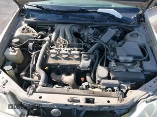 2001 Toyota Avalon XL w/Bucket Seats with VIN 4T1BF28BX1U117793, listed as a IAAI auction lot 42165172 with 247,435 mi miles. Bid and sale history available at carsss.com. Image 10.