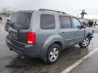 2011 Honda Pilot EX with VIN 5FNYF3H49BB026174, listed as a IAAI auction lot 41795460 with 201,488 mi miles and . Bid and sale history available at carsss.com. Image 4.