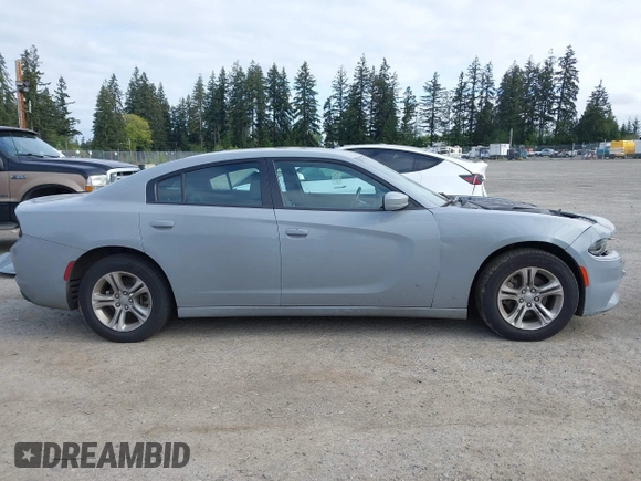 2022 Dodge Charger SXT with VIN 2C3CDXBG4NH201640, listed as a IAAI auction lot 42161657 with 48,690 mi miles and . Bid and sale history available at DreamBid. Image 14.