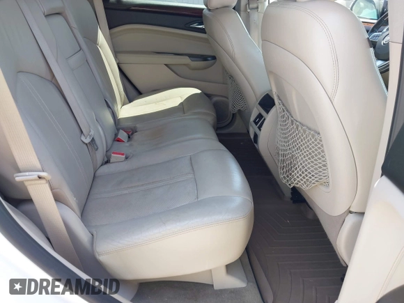 2012 Cadillac SRX Luxury Collection with VIN 3GYFNAE36CS629404, listed as a IAAI auction lot 42077679 with 146,000 mi miles. Bid and sale history available at carsss.com. Image 8.