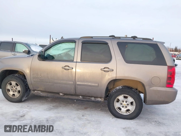 2013 Chevrolet Tahoe LT with VIN 1GNSKBE0XDR296094, listed as a IAAI auction lot 41448160 with 167,165 mi miles and . Bid and sale history available at DreamBid. Image 14.