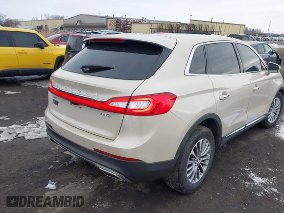 2016 Lincoln MKX Select z VIN 2LMTJ8KR0GBL38074, wystawiony jako IAAI lot #41635344 z przebiegiem 96 239 mil mil oraz . Historia ofert i sprzedaży dostępna na DreamBid. Obrazek 4.