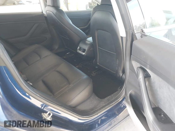 2018 Tesla Model 3 Long Range Battery z VIN 5YJ3E1EA6JF041970, wystawiony jako IAAI lot #42224514 z przebiegiem 79 744 mil mil oraz . Historia ofert i sprzedaży dostępna na DreamBid. Obrazek 8.