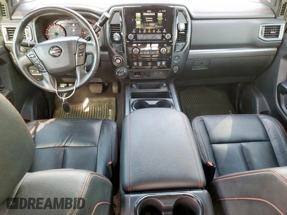 2021 Nissan Titan Pro-4X with VIN 1N6AA1EDXMN523826, listed as a Copart auction lot 61851765 with 85,783 mi miles and Salvage title. Bid and sale history available at DreamBid. Image 8.