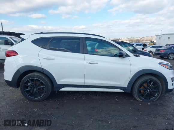 2019 Hyundai Tucson Ultimate with VIN KM8J3CAL2KU949093, listed as a IAAI auction lot 41446521 with 58,446 mi miles. Bid and sale history available at carsss.com. Image 12.