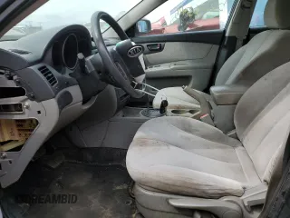 2010 Kia Optima LX z VIN KNAGG4A86A5451165, wystawiony jako Copart lot #52763415 z przebiegiem 213 958 mil mil oraz Szkoda całkowita • Salvage title. Historia ofert i sprzedaży dostępna na DreamBid. Obrazek 7.