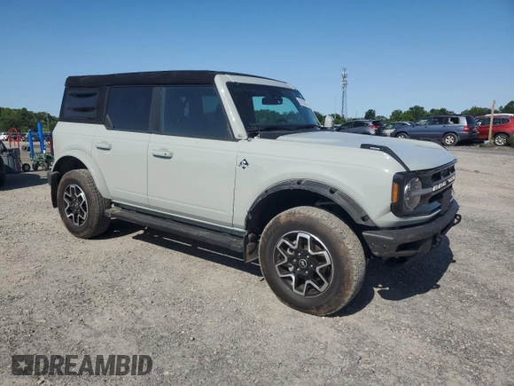 2023 Ford Bronco with VIN 1FMEE5BP0PLC06549, listed as a Copart auction lot 58703305 with 28,051 mi miles and Salvage title. Bid and sale history available at DreamBid. Image 4.
