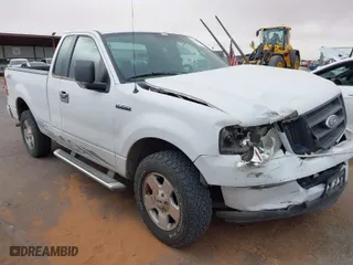 2005 Ford F-150 XL with VIN 1FTRF12295NA49962, listed as a IAAI auction lot 41940905 with 105,922 mi miles. Bid and sale history available at carsss.com. Image 1.