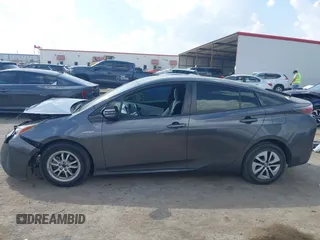 2017 Toyota Prius Two z VIN JTDKARFU3H3030401, wystawiony jako IAAI lot #41882552 z przebiegiem 130 786 mil mil oraz . Historia ofert i sprzedaży dostępna na DreamBid. Obrazek 14.