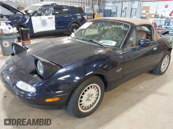 1996 Mazda MX-5 Miata z VIN JM1NA3534T0708649, wystawiony jako IAAI lot #42369564 z przebiegiem 202 690 mil mil oraz . Historia ofert i sprzedaży dostępna na DreamBid. Obrazek 2.