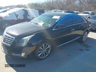 2013 Cadillac XTS Luxury with VIN 2G61P5S31D9116567, listed as a IAAI auction lot 41668056 with 196,744 mi miles. Bid and sale history available at carsss.com. Image 2.