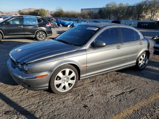 2004 Jaguar X-Type with VIN SAJEA51C74WD70684, listed as a Copart auction lot 46536395 with 155,184 mi miles and Salvage Title. Bid and sale history available at carsss.com. Image 1.