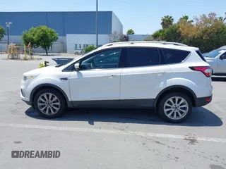 2018 Ford Escape Titanium with VIN 1FMCU0J94JUB26110, listed as a IAAI auction lot 42436285 with 59,586 mi miles and . Bid and sale history available at DreamBid. Image 14.