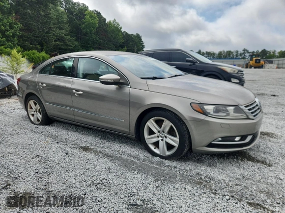 2014 Volkswagen CC Sport с VIN WVWBN7AN2EE509613, выставлен на аукционе Copart как лот 61609035 с пробегом 118 364 миль миль и Чистый • Clean title. История ставок и продаж доступна на DreamBid. Изображение 4.