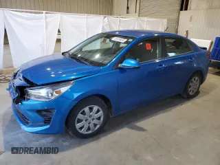 2021 Kia Rio S with VIN 3KPA24ADXME422202, listed as a Copart auction lot 85538434 with 99,138 mi miles and Salvage Title. Bid and sale history available at DreamBid. Image 1.