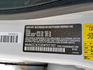 2014 MINI Countryman S with VIN WMWZC3C53EWT01161, listed as a Copart auction lot 50586965 with 151,813 mi miles and Salvage Title. Bid and sale history available at DreamBid. Image 13.