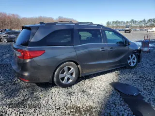 2018 Honda Odyssey EX-L with VIN 5FNRL6H75JB044985, listed as a Copart auction lot 50081345 with 157,688 mi miles and Salvage Title. Bid and sale history available at DreamBid. Image 3.