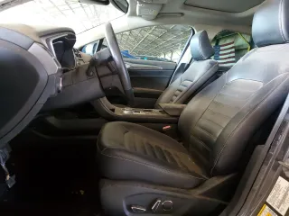 2020 Ford Fusion SEL z VIN 3FA6P0CD3LR131180, wystawiony jako Copart lot #63843355 z przebiegiem 146 705 mil mil oraz Czysty tytuł • Clean title. Historia ofert i sprzedaży dostępna na DreamBid. Obrazek 7.
