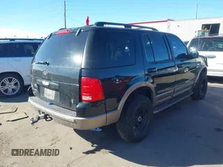 2002 Ford Explorer Eddie Bauer z VIN 1FMDU74W82ZC83464, wystawiony jako IAAI lot #41652672 z przebiegiem 145 151 mil mil oraz . Historia ofert i sprzedaży dostępna na DreamBid. Obrazek 4.