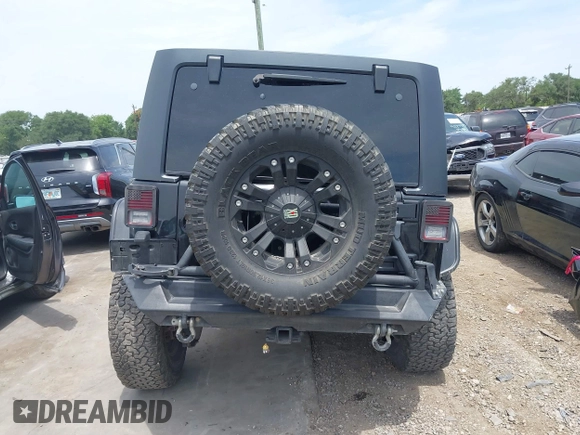 2012 Jeep Wrangler Unlimited Sport with VIN 1C4BJWDG3CL200826, listed as a IAAI auction lot 42261113 with 135,554 mi miles and . Bid and sale history available at DreamBid. Image 17.