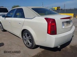 2004 Cadillac CTS with VIN 1G6DM577340132359, listed as a IAAI auction lot 42174306 with 165,844 mi miles. Bid and sale history available at carsss.com. Image 3.