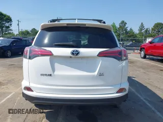 2017 Toyota RAV4 LE with VIN JTMBFREV8HJ157555, listed as a IAAI auction lot 42147300 with 81,187 mi miles and . Bid and sale history available at DreamBid. Image 16.