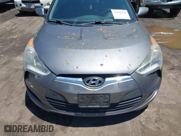 2015 Hyundai Veloster z VIN KMHTC6AD9FU226544, wystawiony jako IAAI lot #42539111 z przebiegiem 121 631 mil mil oraz . Historia ofert i sprzedaży dostępna na DreamBid. Obrazek 6.