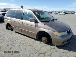2003 Honda Odyssey EX-L z VIN 5FNRL18043B154662, wystawiony jako Copart lot #52896015 z przebiegiem 216 099 mil mil oraz Szkoda całkowita • Salvage title. Historia ofert i sprzedaży dostępna na DreamBid. Obrazek 4.
