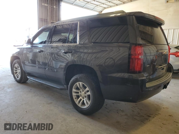 2015 Chevrolet Tahoe LS with VIN 1GNSCAKC5FR501801, listed as a Copart auction lot 50850645 with 112,896 mi miles and Salvage title. Bid and sale history available at DreamBid. Image 2.