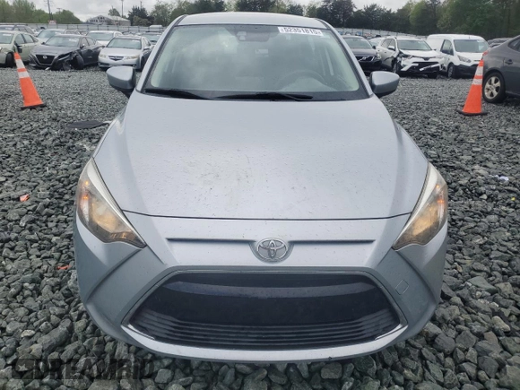 2018 Toyota Yaris with VIN 3MYDLBYV2JY329621, listed as a Copart auction lot 52351815 with 127,195 mi miles and Salvage Title. Bid and sale history available at DreamBid. Image 5.
