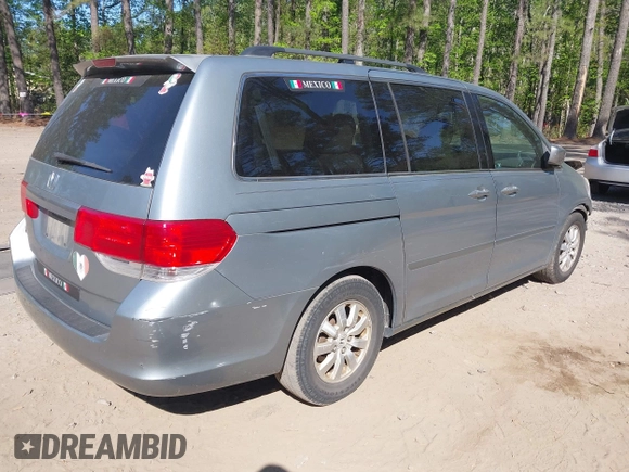 2008 Honda Odyssey EX with VIN 5FNRL38428B067056, listed as a IAAI auction lot 42051312 with 199,405 mi miles. Bid and sale history available at carsss.com. Image 4.